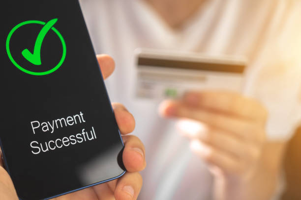 Mobile phone transaction, payment successful screen and bank credit card in woman hand on background