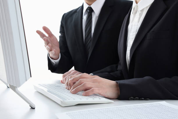 Business man and woman working together