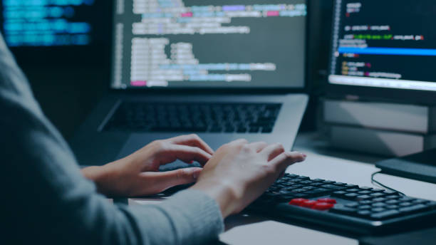 Closeup hand of developer programmer, software engineer, IT support, typing on computer keyboard