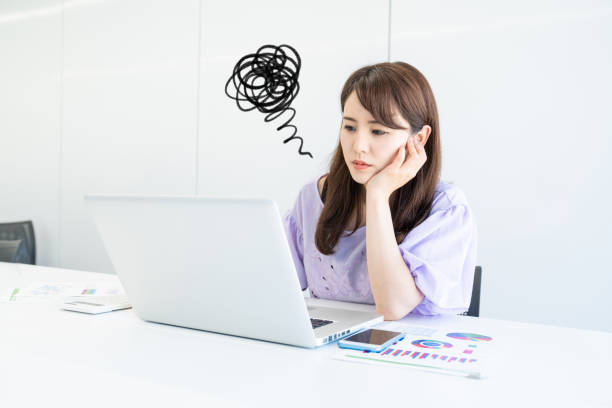 Confused young asian girl.